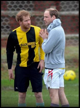 . 24 12 2015. Castle Rising, United Kingdom. Prince William and Prince Harry playing football on Christmas Eve in Castle Rising, Norfolk.  xAndrewxParsonsx xi-Imagesx IIM-11620-0024