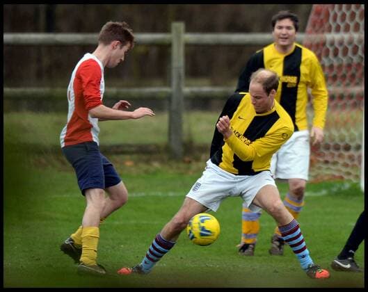 . 24 12 2015. Castle Rising, United Kingdom. Prince William and Prince Harry playing football on Christmas Eve in Castle Rising, Norfolk.  xAndrewxParsonsx xi-Imagesx IIM-11620-0009