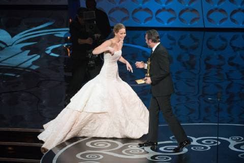 Feb 24, 2013 - Hollywood, California, U.S. - The Oscar for performance by an actress in a leading role goes to JENNIFER LAWRENCE for her role in Silver Linings Playbook presented by JEAN DUJARDIN during The Oscars from the Dolby Theatre in Hollywood, Sunday, live on the ABC Television Network. Jennifer tripped and fell while walking stairs to collect her award. - ZUMAz03