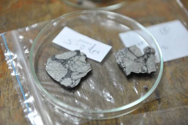Feb. 26, 2013 - Moscow, Russia - February 26,2013.Moscow,Russia. Chebarkul meteorite is the proposed name for the fragments of the asteroid that entered the atmosphere of Earth and caused the Russian meteor event on February 15, 2013. ..Pictured: Vernatsky Institut of Geochemistry, Moscow. Chebarkul meteorite fragments found at Chebarkul lake.  - ZUMAeor