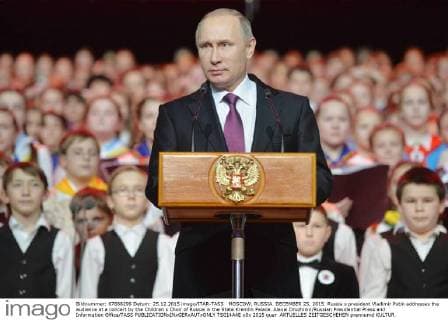 MOSCOW, RUSSIA. DECEMBER 25, 2015. Russia s president Vladimir Putin addresses the audience at a concert by the Children s Choir of Russia in the State Kremlin Palace. Alexei Druzhinin Russian Presidential Press and Information Office TASS  TS014A4E