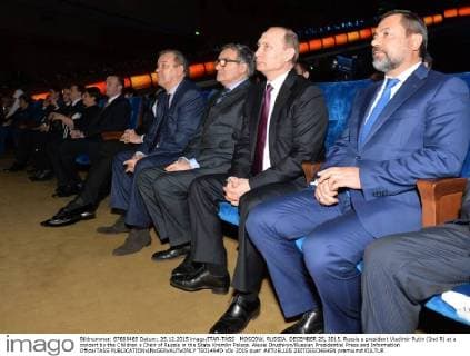 MOSCOW, RUSSIA. DECEMBER 25, 2015. Russia s president Vladimir Putin (2nd R) at a concert by the Children s Choir of Russia in the State Kremlin Palace. Alexei Druzhinin Russian Presidential Press and Information Office TASS  TS014A4D