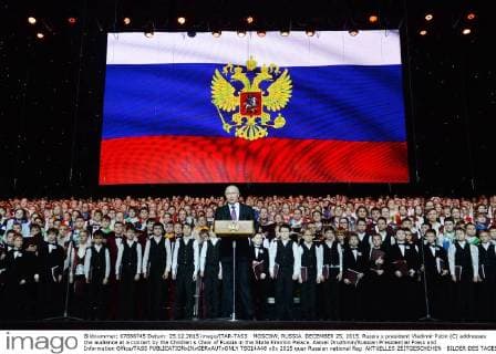 MOSCOW, RUSSIA. DECEMBER 25, 2015. Russia s president Vladimir Putin (C) addresses the audience at a concert by the Children s Choir of Russia in the State Kremlin Palace. Alexei Druzhinin Russian Presidential Press and Information Office TASS  TS014A48