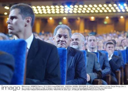 MOSCOW, RUSSIA. DECEMBER 25, 2015. Russia s defence minister Sergei Shoigu (2nd L) at a concert by the Children s Choir of Russia in the State Kremlin Palace. Alexei Druzhinin Russian Presidential Press and Information Office TASS  TS014A4B
