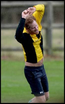 . 24 12 2015. Castle Rising, United Kingdom. Prince William and Prince Harry playing football on Christmas Eve in Castle Rising, Norfolk. Prince Harry celebrates with another team player as his team score  xAndrewxParsonsx xi-Imagesx IIM-11620-0067