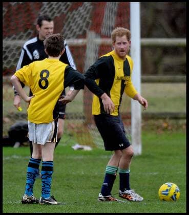 . 24 12 2015. Castle Rising, United Kingdom. Prince William and Prince Harry playing football on Christmas Eve in Castle Rising, Norfolk.  xAndrewxParsonsx xi-Imagesx IIM-11620-0045