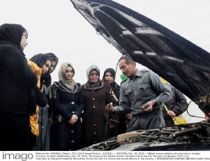 (151226) -- JOWZJAN, Dec. 25, 2015 -- Afghan women attend a driving class in Jowzjan province, northern Afghanistan, Dec. 25, 2015. The status of the Afghan women has been improving over the past one decade. There is no restriction by the government for the women drivers but still it is rare to see women drivers in the country. ) AFGHANISTAN-JOWZJAN-DRIVING CLASS MohammadxAriaxjan 