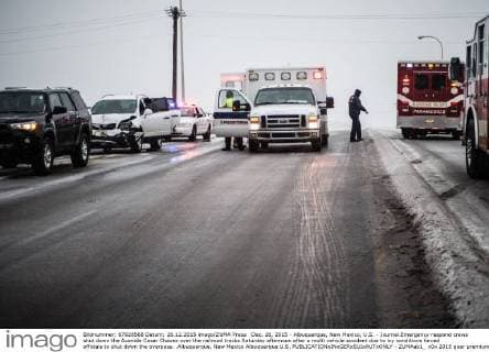 Dec. 26, 2015 - Albuquerque, New Mexico, U.S. - Journal.Emergency respond crews shut down the Avenida Cesar Chavez over the railroad tracks Saturday afternoon after a multi vehicle accident due to icy conditions forced officials to shut down the overpass. .Albuquerque, New Mexico Albuquerque U.S. - ZUMAab1_
