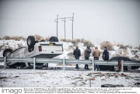 Dec. 26, 2015 - Albuquerque, New Mexico, U.S. - Journal.Pictured is one of many rollovers along interstate 25 northbound just south of Albuquerque Saturday afternoon due to the wintry conditional on the roads. .Albuquerque, New Mexico Albuquerque U.S. - ZUMAab1_