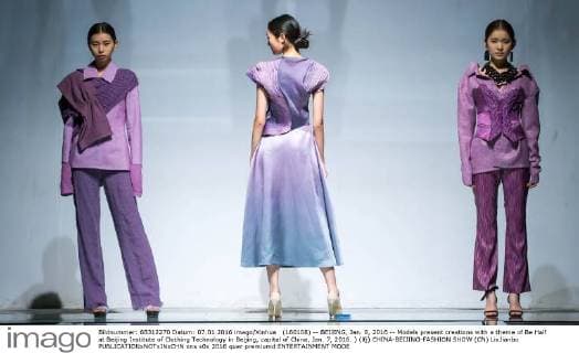 (160108) -- BEIJING, Jan. 8, 2016 -- Models present creations with a theme of Be Half at Beijing Institute of Clothing Technology in Beijing, capital of China, Jan. 7, 2016. ) (lfj) CHINA-BEIJING-FASHION SHOW (CN) LixJianbo 