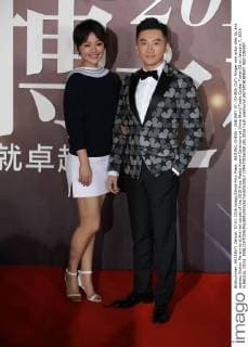 BEIJING, CHINA - JANUARY 07: (CHINA OUT) Singer and actor Alec Su and actress Sichun Ma arrive at the red carpet of the 2015 Sina Weibo Award Ceremony at China World Trade Center Tower III on January 7, 2016 in Beijing, China.  CFP477916058