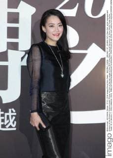 BEIJING, CHINA - JANUARY 07: (CHINA OUT) Mani Fok, artist management director of the Emperor Entertainment Group, arrives at the red carpet of the 2015 Sina Weibo Award Ceremony at China World Trade Center Tower III on January 7, 2016 in Beijing, China.  CFP477916103