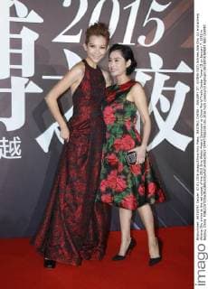 BEIJING, CHINA - JANUARY 07: (CHINA OUT) Actress Ada Choi (L) and actress Athena Chu arrive at the red carpet of the 2015 Sina Weibo Award Ceremony at China World Trade Center Tower III on January 7, 2016 in Beijing, China.  CFP477916108