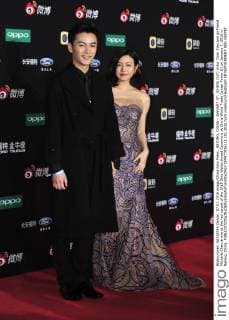 BEIJING, CHINA - JANUARY 07: (CHINA OUT) Actor Chen Xiao and girlfriend Michelle Chen arrive at the red carpet of the 2015 Sina Weibo Award Ceremony at China World Trade Center Tower III on January 7, 2016 in Beijing, China.  CFP477916111