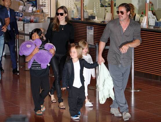 July 28, 2013 - Tokyo, Japan - Actor BRAD PITT and actress ANGELINA JOLIE arrive at Tokyo International Airport with their children on July 28, 2013 in Tokyo, Japan. - ZUMAjn1