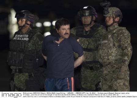 (160109) -- MEXICO CITY, Jan. 8, 2016 -- Soldiers escort Joaquin Guzman Loera, alias El Chapo , upon his arrival to the hangar of the Attorney General s Office, in Mexico City, capital of Mexico, on Jan. 8, 2016. After an early morning raid in northwestern Mexico s Sinaloa State s town of Los Mochis by Mexican police and marines on Friday, Sinaloa Cartel leader Joaquin Guzman Loera was recaptured, six months after his second prison break. Alejandro Ayala) MEXICO-MEXICO CITY-SECURITY-GUZMAN LOERA-RECAPTURE PedroxMera