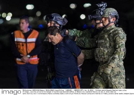 (160109) -- MEXICO CITY, Jan. 8, 2016 -- Soldiers escort Joaquin Guzman Loera, alias El Chapo , upon his arrival to the hangar of the Attorney General s Office, in Mexico City, capital of Mexico, on Jan. 8, 2016. After an early morning raid in northwestern Mexico s Sinaloa State s town of Los Mochis by Mexican police and marines on Friday, Sinaloa Cartel leader Joaquin Guzman Loera was recaptured, six months after his second prison break. ) MEXICO-MEXICO CITY-SECURITY-GUZMAN LOERA-RECAPTURE PedroxMera