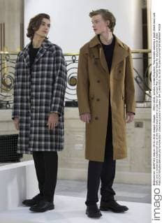 . 09 01 2016. London, United Kingdom. Two models wearing a block check wool coat (left) and a rubberized traditional mac at the Mackintosh show on day two of London Men s Fashion Week for autumn winter 2016.  xStephenxLockx xi-Imagesx IIM-11693-0001