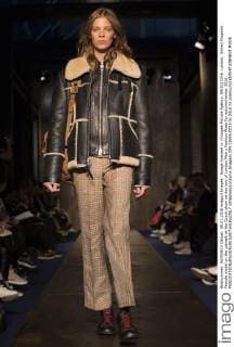 Image licensed to i-Images Picture Agency. 09 01 2016. London, United Kingdom. Female model on the catwalk at the Coach show on day two of London Men s Fashion Week for autumn winter 2016.  xStephenxLockx xi-Imagesx IIM-11695-0015