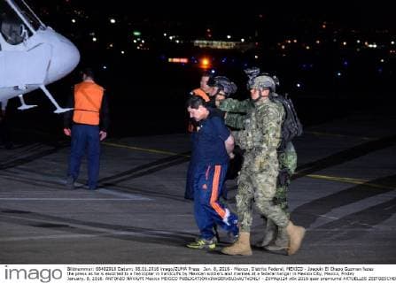 Jan. 8, 2016 - Mexico, Distrito Federal, MEXICO - Joaquin El Chapo Guzman faces the press as he is escorted to a helicopter in handcuffs by Mexican soldiers and marines at a federal hangar in Mexico City, Mexico, Friday January. 8, 2016. ANTONIO NAVA PI Mexico MEXICO - ZUMAp124