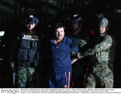Jan. 8, 2016 - Mexico, Distrito Federal, MEXICO - Joaquin El Chapo Guzman faces the press as he is escorted to a helicopter in handcuffs by Mexican soldiers and marines at a federal hangar in Mexico City, Mexico, Friday January. 8, 2016. ANTONIO NAVA PI Mexico MEXICO - ZUMAp124