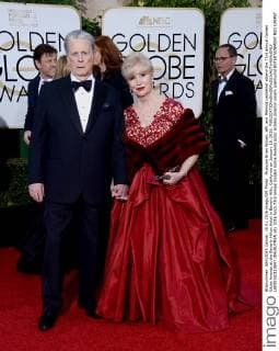 Musician Brian Wilson, left, and Melinda Ledbetter attend the 73rd annual Golden Globe Awards at the Beverly Hilton Hotel in Beverly Hills, California on January 10, 2016.  LAP20160110847 JIMxRUYMEN