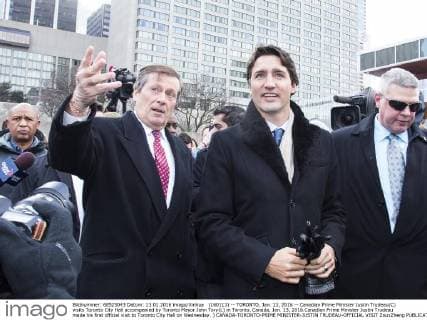 (160113) -- TORONTO, Jan. 13, 2016 -- Canadian Prime Minister Justin Trudeau(C) visits Toronto City Hall accompanied by Toronto Mayor John Tory(L) in Toronto, Canada, Jan. 13, 2016.Canadian Prime Minister Justin Trudeau made his first official visit to Toronto City Hall on Wednesday. ) CANADA-TORONTO-PRIME MINISTER-JUSTIN TRUDEAU-OFFICIAL VISIT ZouxZheng 