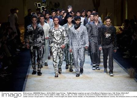 Models display creations as part of the Dolce & Gabbana men s Fall-Winter 2016-2017 show collection during Milan Fashion Week in Milan, Italy, on Jan. 16, 2016. Inspired by the iconic Spaghetti Western movies directed by an Italian director Sergio Leone in the 1960s, which brought the Italian movie industry to the attention of the international crowds, the collection shows a contrast between the past (via the embroideries and embellishments of the Wild West) and the present (the shapes, cut, and fit). ) ITALY-MILAN-D&G-FASHION WEEK JinxYu 