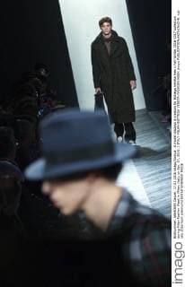 A model displays a creation for Bottega Veneta men s Fall-Winter 2016-2017 collection during Milan Fashion Week in Milan, Italy, on Jan. 17, 2016. ) ITALY-MILAN-BOTTEGA VENETA-FASHION WEEK jinxyu 