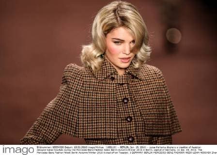(160119) -- BERLIN, Jan. 19, 2016 -- Luisa Hertema displays a creation of Austrian designer Lena Hoschek during the Mercedes-Benz Fashion Week Berlin Autumn Winter 2016 in Berlin, capital of Germany, on Jan. 19, 2016. The Mercedes-Benz Fashion Week Berlin Autumn Winter 2016 kicked off on Tuesday. ) GERMANY-BERLIN-MERCEDES-BENZ FASHION WEEK-LENA HOSCHEK ZhangxFan 