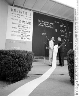 Dec. 14, 2012 - Scientists show off reams of data collected by Mariner 2 at Venus. Mariner 2 was the first spacecraft to reach another planet. On Dec. 14, 1962, NASA s Mariner 2 spacecraft sailed close to the shrouded planet Venus, marking the first time any spacecraft had ever successfully made a close-up study of another planet. It flew by Venus as planned at a range of 34,762 km (21,600 miles), scanning the planet s atmosphere and surface for 42 minutes. The spacecraft showed that surface temperature on Venus was at least 425 - ZUMAz03_