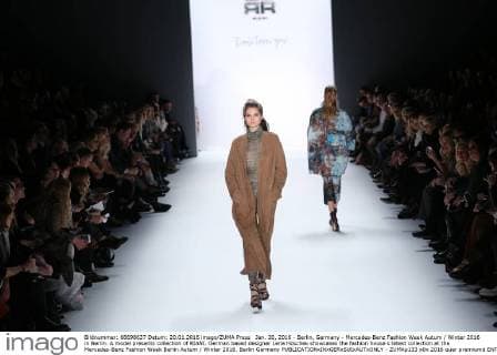 Jan. 20, 2016 - Berlin, Germany - Mercedes-Benz Fashion Week Autum Winter 2016 in Berlin. A model presents collection of RIANI. German based designer Lena Hoschek showcases the fashion house s latest collection at the Mercedes-Benz Fashion Week Berlin Autum Winter 2016. Berlin Germany - ZUMAp133