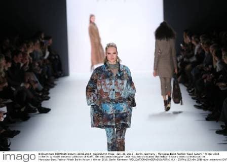 Jan. 20, 2016 - Berlin, Germany - Mercedes-Benz Fashion Week Autum Winter 2016 in Berlin. A model presents collection of RIANI. German based designer Lena Hoschek showcases the fashion house s latest collection at the Mercedes-Benz Fashion Week Berlin Autum Winter 2016. Berlin Germany - ZUMAp133