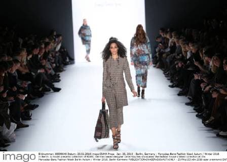 Jan. 20, 2016 - Berlin, Germany - Mercedes-Benz Fashion Week Autum Winter 2016 in Berlin. A model presents collection of RIANI. German based designer Lena Hoschek showcases the fashion house s latest collection at the Mercedes-Benz Fashion Week Berlin Autum Winter 2016. Berlin Germany - ZUMAp133