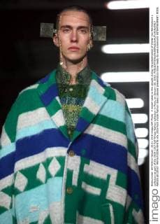 A model takes to the catwalk during the presentation of Walter Van Beirendonck s collection as part of the 2016-1017 Fall-Winter fashion collection in Paris, on January 20, 2016.  PAR20160120107 MAYAxVIDON-WHITE