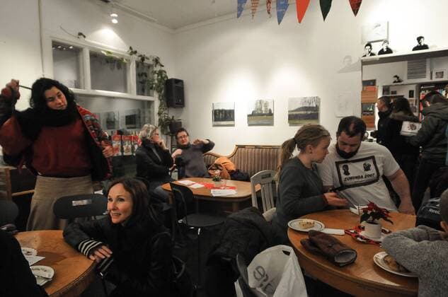 Dec. 14, 2013 - UmeÃ, Västerbotten, Swedem - 14 December 2013, Umea, Sweden: On a cold, dark saturday wintry afternoon, around 3pm in UmeÃ¥ the artsy Bokcafe Pilgatan is a popular place to ride out the darkness. UmeÃ¥, a university town, has an unexpected lively cultural scene, the more so as it gets ready for it s year as Cultural Capitol of Europe in 2014. - ZUMAs51_