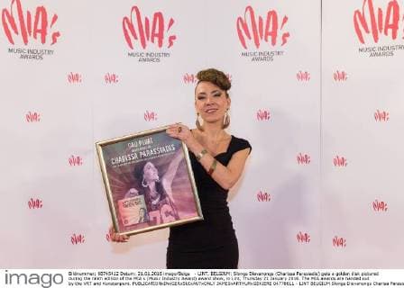 - LINT, BELGIUM: Slongs Dievanongs (Charissa Parasiadis) gets a golden disk pictured during the ninth edition of the MIA s (Music Industry Award) award show, in Lint, Thursday 21 January 2016. The MIA awards are handed out by the VRT and Kunstenpunt.  JAMESxARTHURxGEKIERE 04778611