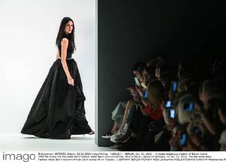(160121) -- BERLIN, Jan. 21, 2016 -- A model displays a creation of Italian brand DIMITRI during the Mercedes-Benz Fashion Week Berlin Autumn Winter 2016 in Berlin, capital of Germany, on Jan. 21, 2016. The Mercedes-Benz Fashion Week Berlin Autumn Winter 2016 kicked off on Tuesday. ) GERMANY-BERLIN-FASHION WEEK ZhangxFan 