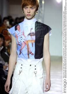 A model takes to the catwalk during the presentation of Christian Dada s collection as part of the 2016-1017 Fall-Winter men fashion collections in Paris, on January 22, 2016.  PAR20160122109 MAYAxVIDON-WHITE