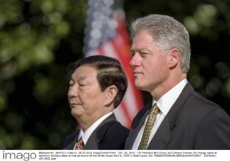 Oct. 20, 2012 - US President Bill Clinton and Chinese Premier Zhu Rongji stand at attention during a state arrival ceremony at the White House April 8, 1999 in Washington, DC. - ZUMAe02_