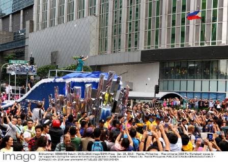 Jan. 25, 2016 - Manila, Philippines - Miss Universe 2015 Pia Wurtzbach waves to her supporters during the welcome homecoming parade in Ayala Avenue in Makati City. Manila Philippines - ZUMAp133