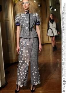 A model takes to the catwalk during the presentation of Antonio Ortega s collection as part of the 2016 Spring Summer High Fashion collections in Paris, on January 25, 2016.  PAR20160125103 MAYAxVIDON-WHITE