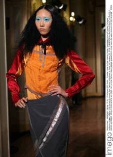 A model takes to the catwalk during the presentation of Antonio Ortega s collection as part of the 2016 Spring Summer High Fashion collections in Paris, on January 25, 2016.  PAR20160125112 MAYAxVIDON-WHITE