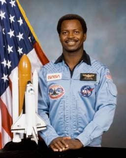 Official NASA portrait, taken on July 2, 1985, of astronaut Ronald E. McNair, Mission Specialist for STS-51-L. On January 28, 1986, at 11:39 a.m. EST, the Space Shuttle Challenger and her seven-member crew were lost when a ruptured O-ring in the right Solid Rocket Booster caused an explosion 73 seconds after launch.  WAX2016012507 NASA......