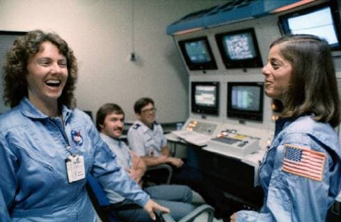 Christa McAuliffe and her backup, Barbara Morgan, Teacher in Space Project (TISP) payload specialist participants, are pictured training for the STS-51-L mission in the Shuttle Mission Simulator (SMS) on November 16, 1985. On January 28, 1986, at 11:39 a.m. EST, the Space Shuttle Challenger and her seven-member crew were lost when a ruptured O-ring in the right Solid Rocket Booster caused an explosion 73 seconds after launch. Morgan would later successfully fly aboard the Space Shuttle Endeavour (STS-118) in August 2007.  WAX2016012513 NASA......