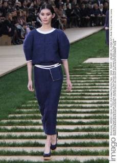 PARIS, FRANCE - JANUARY 26: (CHINA OUT) Model Ming Xi walks the runway during the Chanel Spring Summer 2016 show as part of Paris Fashion Week on January 26, 2016 in Paris, France.  CFP478736231