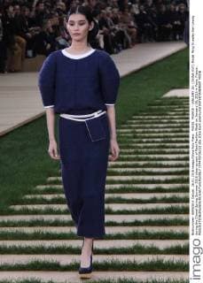 PARIS, FRANCE - JANUARY 26: (CHINA OUT) Model Ming Xi walks the runway during the Chanel Spring Summer 2016 show as part of Paris Fashion Week on January 26, 2016 in Paris, France.  CFP478736232