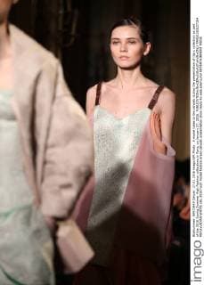 A model takes to the catwalk during the presentation of Ilja s collection as part of the 2016 Spring Summer High Fashion collections in Paris, on January 27, 2016.  PAR20160127104 MAYAxVIDON-WHITE