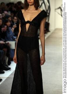 A model takes to the catwalk during the presentation of Loris Azzaro s collection as part of the 2016 Spring Summer High Fashion collections in Paris on January 28, 2016.  PAR20160128105 MAYAxVIDON-WHITE