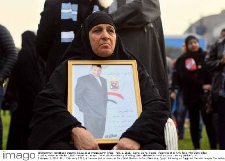 Feb. 1, 2016 - Cairo, Cairo, Egypt - Relatives of al-Ahly fans, who were killed in what known as the Port Said massacre , attend the fourth anniversary of killing their relatives at al-Ahly club s training stadium, on February 1, 2016. On 1 February 2012, a massive riot occurred at Port Said Stadium in Port Said city, Egypt, following an Egyptian Premier League football match between El Masry and El Ahly clubs. At least 74 people were killed and more than 500 were injured after thousands of El Masry spectators stormed the stadium stands and the pitch Cairo Egypt - ZUMAap3_